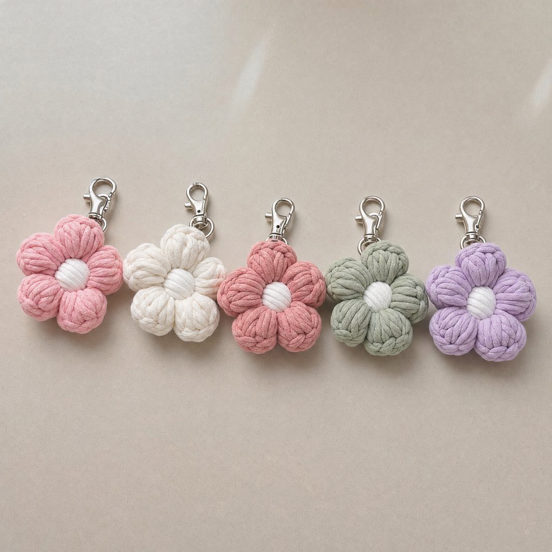 Crochet flower charms in five colours with silver clasps